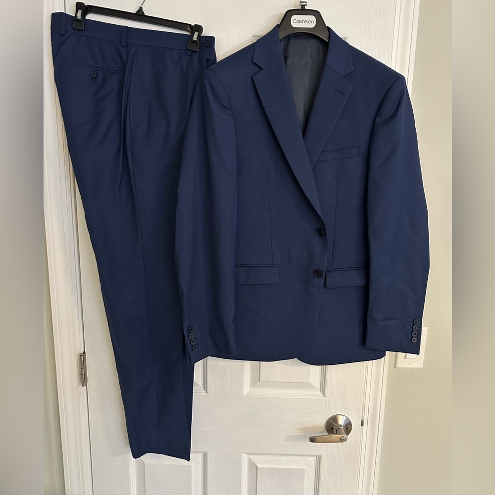 Blue Calvin Kline suit. Worn less than 5 times.